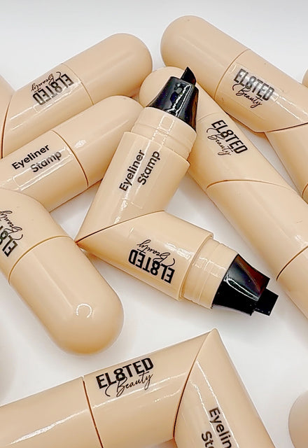 Eyeliner Stamp ✔️ by EL8TED BEAUTY displayed in a creative arrangement for flawless winged eyeliner.